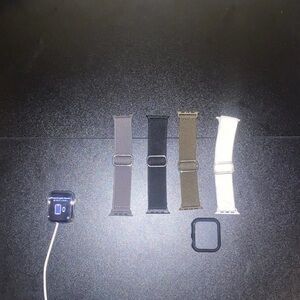 Apple Smartwatch with Black, Gray, Brown, and White Bands